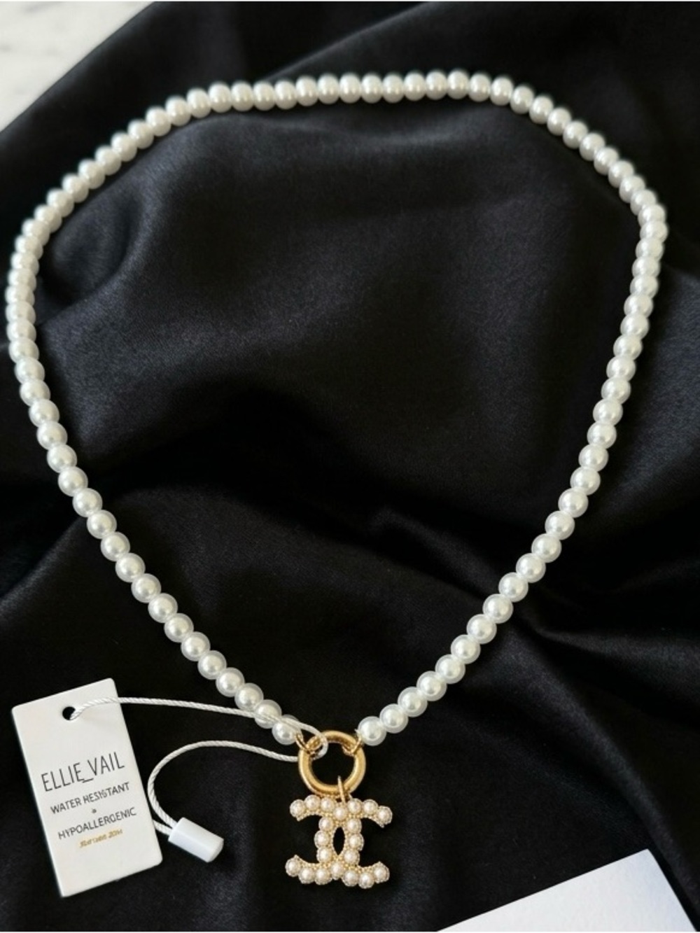 ChaneI Gold Logo Charm with White Faux Pearl Necklace